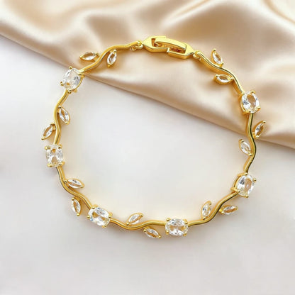 Gold Tone Tulip Crystal Bracelet with Floral Vine Design