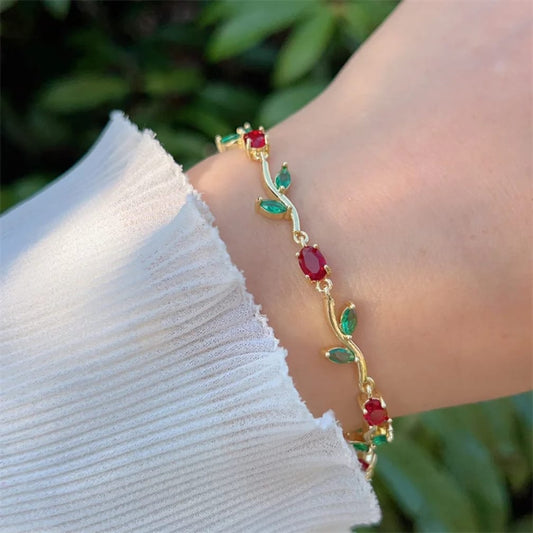 Gold Tone Tulip Crystal Bracelet with Floral Vine Design