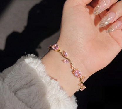 Gold Tone Tulip Crystal Bracelet with Floral Vine Design